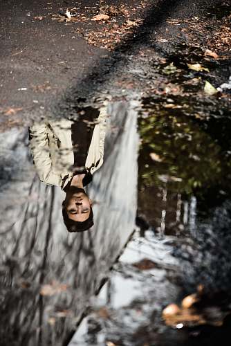 mobile wallpaper selective focus photography of reflection of man wearing gray jacket ford